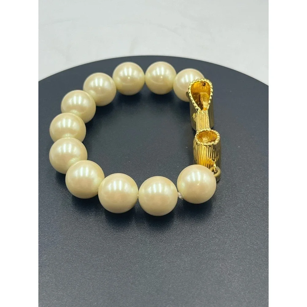 Kate Spade All Wrapped Up Pearl Gold Bow Bracelet‎